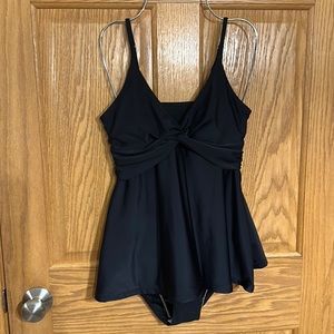 Black Tankini set with top that has crisscross center knot with full bod…